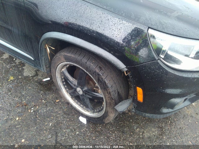 WVGBV7AX7GW057085 Volkswagen Tiguan