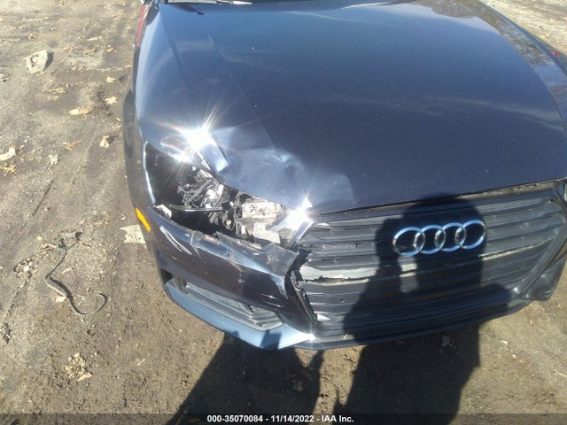 2018 Audi A4, VIN: WAUENAF43JA026057