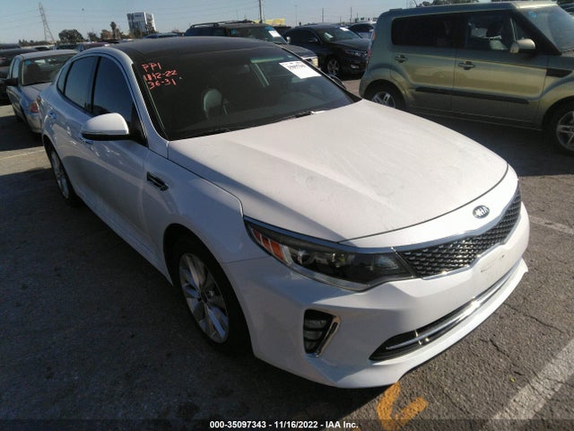 2018 Kia Optima, VIN: 5XXGT4L35JG243631