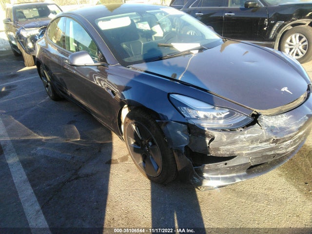 Tesla Model 3 Standard Range Plus 2021 5YJ3E1EA0MF875981 Image 1