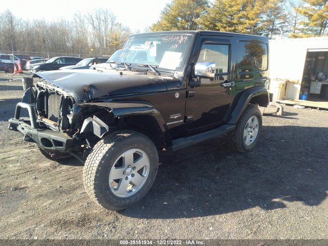 2011 JEEP WRANGLER SAHARA VIN: 1J4GA5D17BL627284