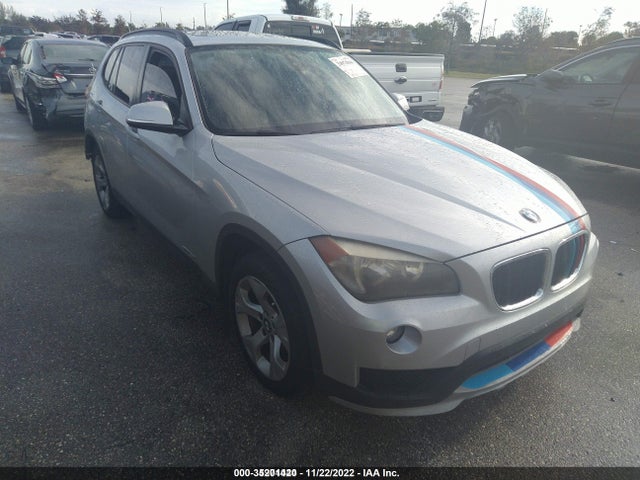 2015 BMW X1, VIN: WBAVM1C54FVW57559