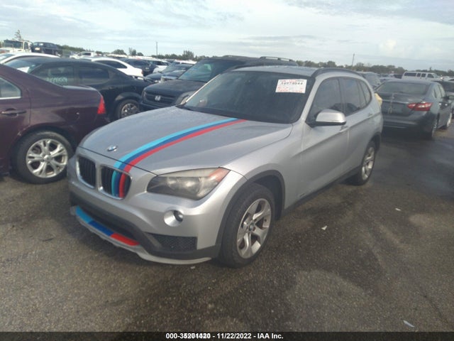 2015 BMW X1, VIN: WBAVM1C54FVW57559
