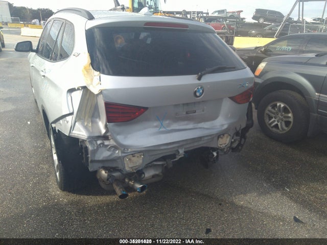 2015 BMW X1, VIN: WBAVM1C54FVW57559