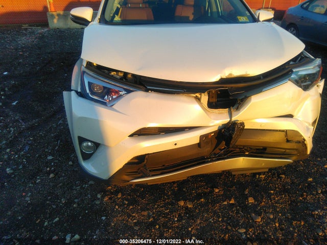 2016 Toyota RAV4, VIN: JTMDJREV0GD037057
