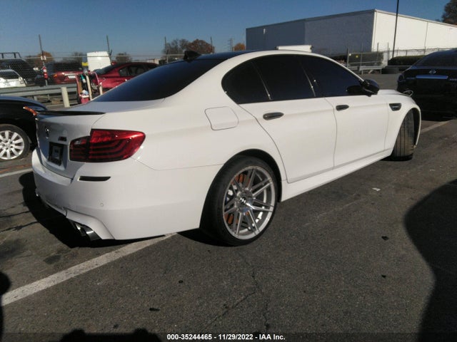 2014 BMW M5, VIN: WBSFV9C55ED594097