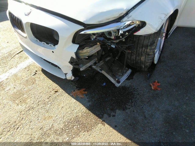 2014 BMW M5, VIN: WBSFV9C55ED594097