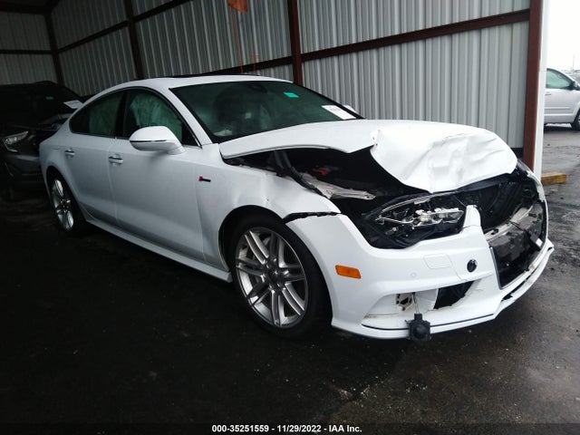 2016 Audi A7, VIN: WAUWGAFC9GN094239