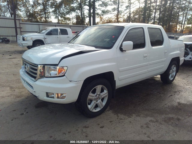 2012 HONDA RIDGELINE RTL VIN: 5FPYK1F59CB453097