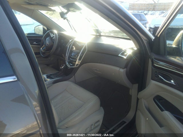 2015 Cadillac SRX, VIN: 3GYFNBE35FS598110