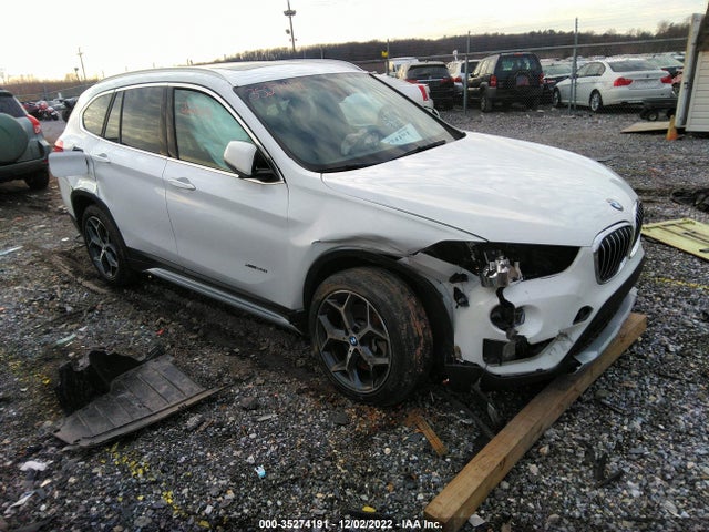 2018 BMW X1, VIN: WBXHT3Z36J4A66044