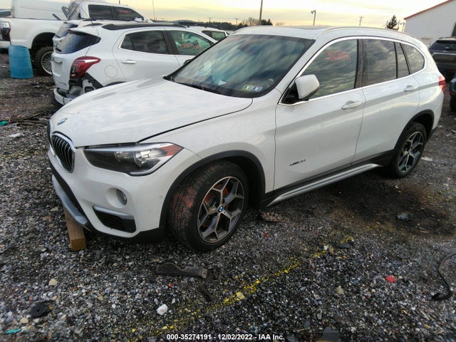 2018 BMW X1, VIN: WBXHT3Z36J4A66044