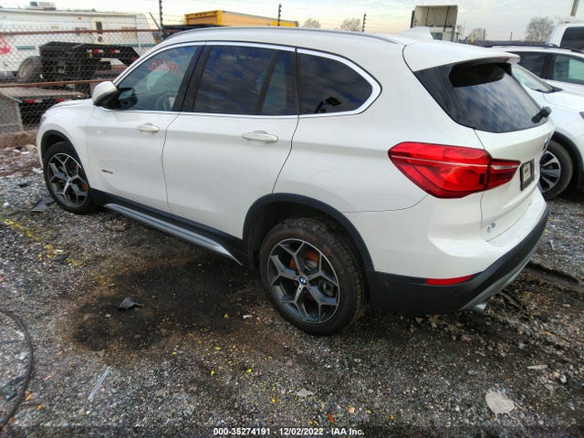 2018 BMW X1, VIN: WBXHT3Z36J4A66044