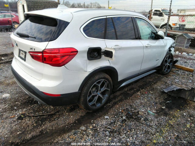 2018 BMW X1, VIN: WBXHT3Z36J4A66044