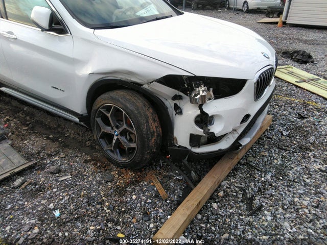2018 BMW X1, VIN: WBXHT3Z36J4A66044