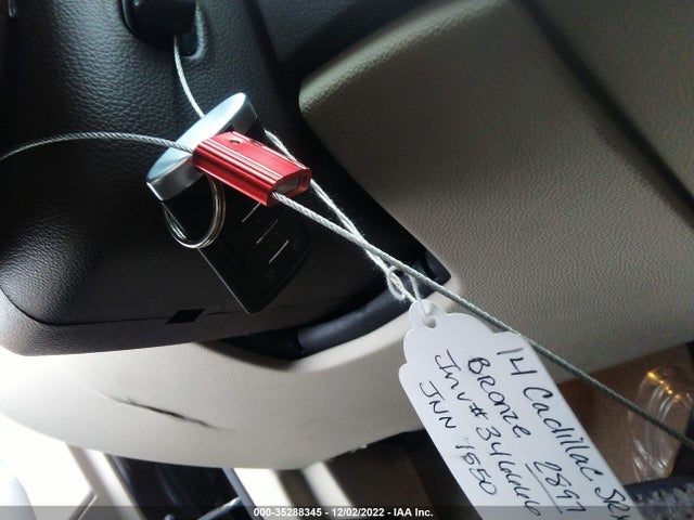 2014 Cadillac SRX, VIN: 3GYFNBE3XES662897