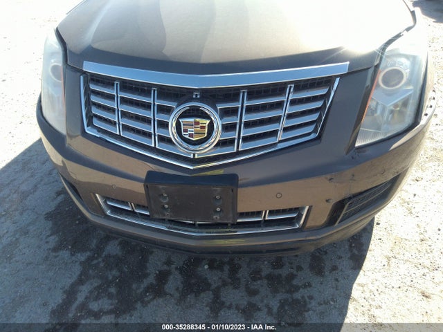 2014 Cadillac SRX, VIN: 3GYFNBE3XES662897