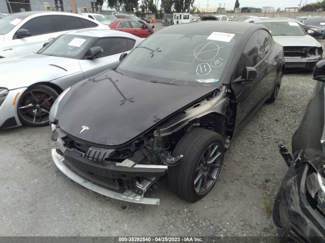 Tesla Model 3 Standard Range Plus 2021 5YJ3E1EAXMF998798 Image 2
