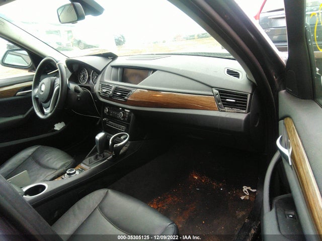 2014 BMW X1, VIN: WBAVM5C50EVV93302