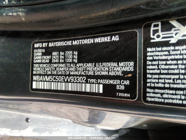 2014 BMW X1, VIN: WBAVM5C50EVV93302