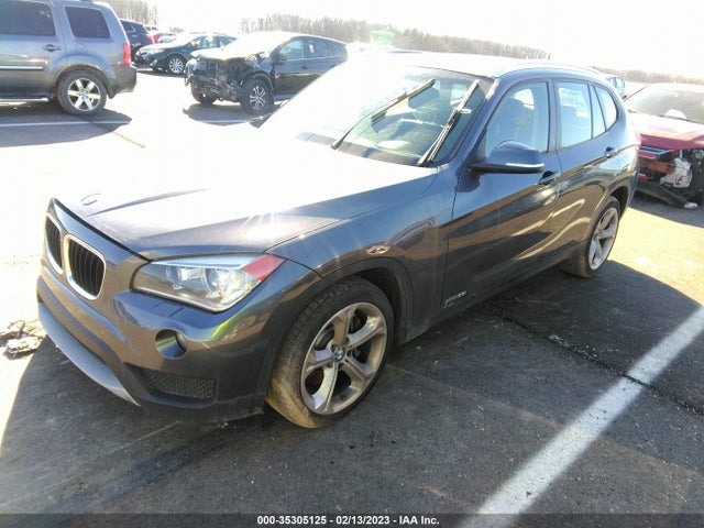2014 BMW X1, VIN: WBAVM5C50EVV93302