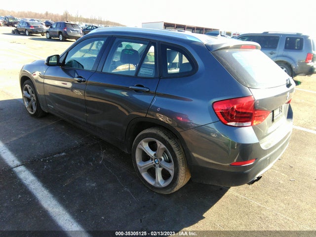 2014 BMW X1, VIN: WBAVM5C50EVV93302