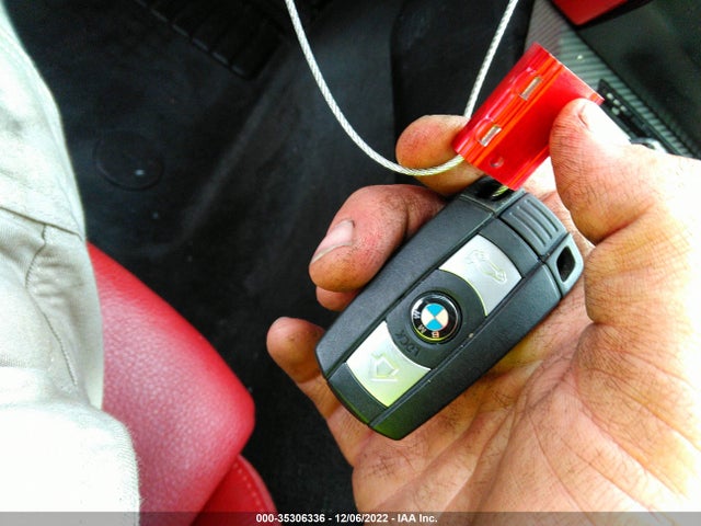 2015 BMW Z4, VIN: WBALM7C58FJ798751