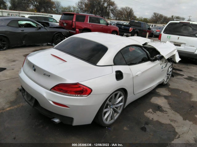 2015 BMW Z4, VIN: WBALM7C58FJ798751