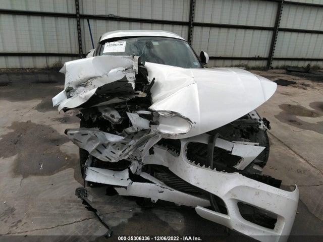 2015 BMW Z4, VIN: WBALM7C58FJ798751