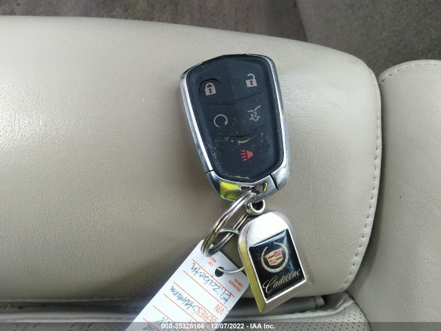 2015 Cadillac SRX, VIN: 3GYFNBE35FS557931