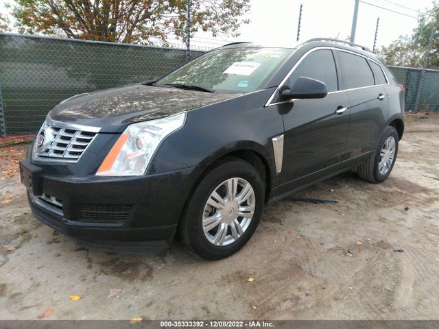 2014 Cadillac SRX, VIN: 3GYFNAE39ES565569