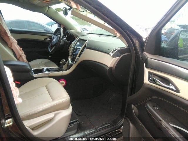 2014 Cadillac SRX, VIN: 3GYFNAE39ES565569