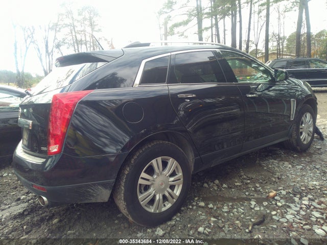 2015 Cadillac SRX, VIN: 3GYFNBE38FS548690