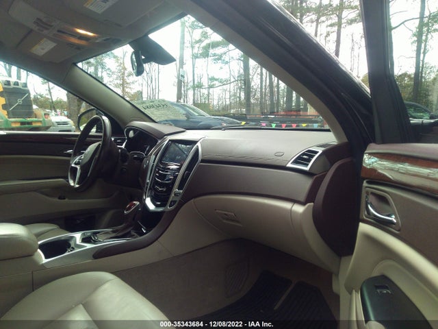2015 Cadillac SRX, VIN: 3GYFNBE38FS548690