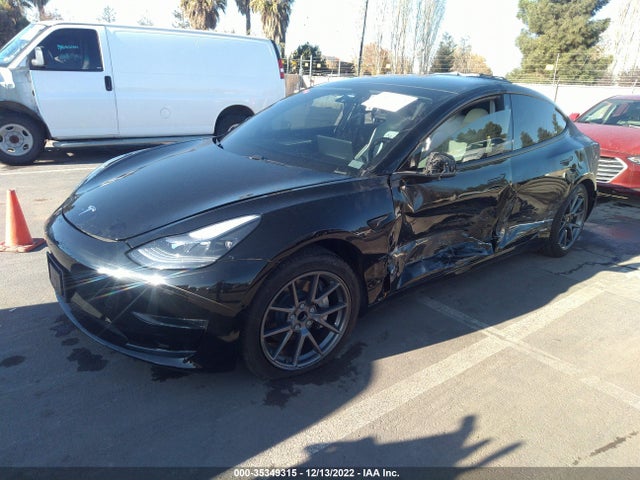 Tesla Model 3 Standard Range Plus 2021 5YJ3E1EA4MF032009 Image 2