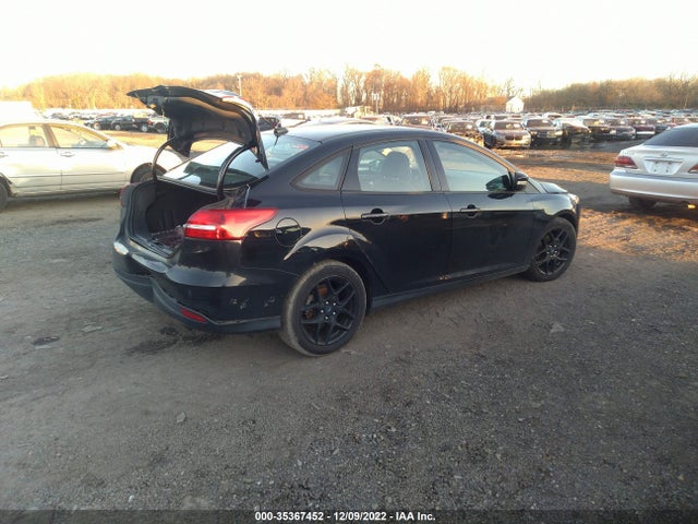 2016 Ford Focus, VIN: 1FADP3F29GL401360