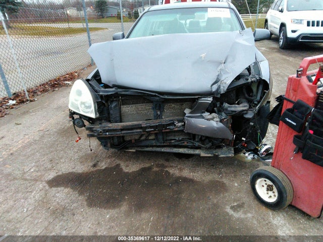2006 KIA OPTIMA LX/EX VIN: KNAGE124165035306
