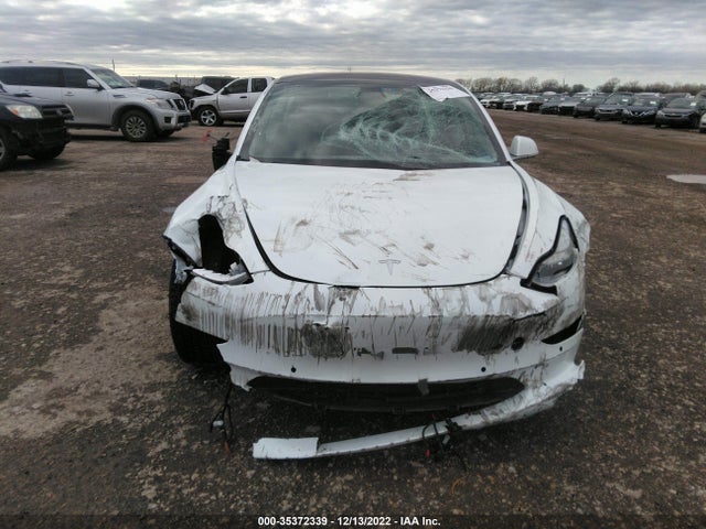 Tesla MODEL 3 2018 5YJ3E1EA8JF053649 Image 6