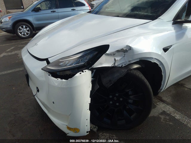 2021 Tesla Model Y, VIN: 5YJYGAEE0MF244344