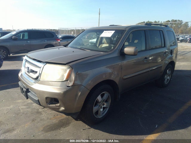 2011 HONDA PILOT EX-L VIN: 5FNYF3H51BB027554