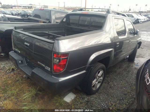 2014 HONDA RIDGELINE RTL VIN: 5FPYK1F54EB006907