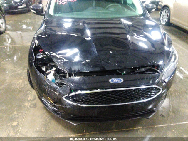 2018 Ford Focus, VIN: 1FADP3M22JL287132