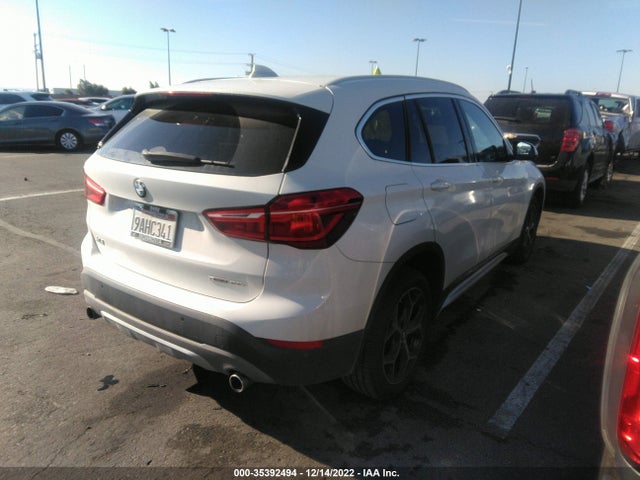 2018 BMW X1, VIN: WBXHU7C3XJ3H42630