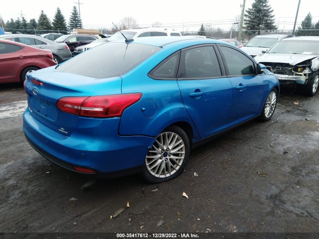 2016 Ford Focus, VIN: 1FADP3F23GL225034