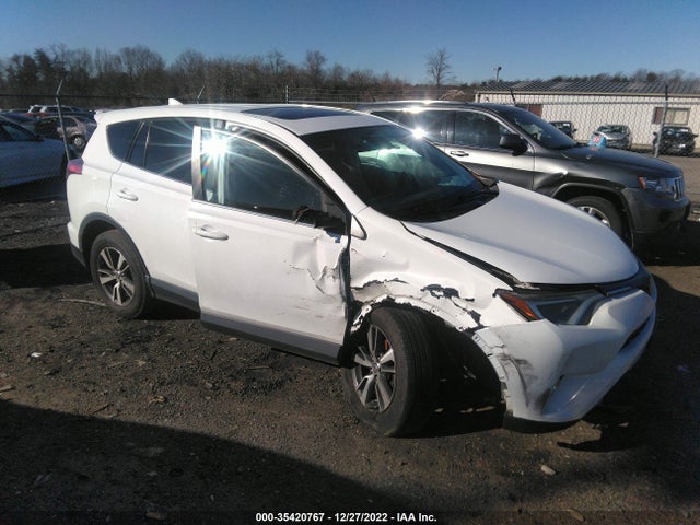 2018 Toyota RAV4, VIN: 2T3WFREV3JW476208