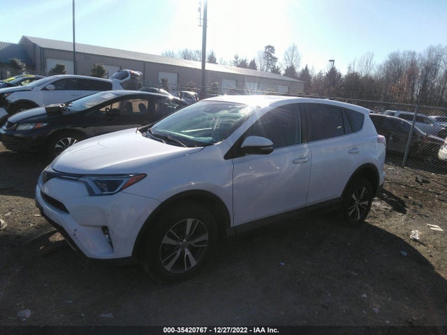 2018 Toyota RAV4, VIN: 2T3WFREV3JW476208