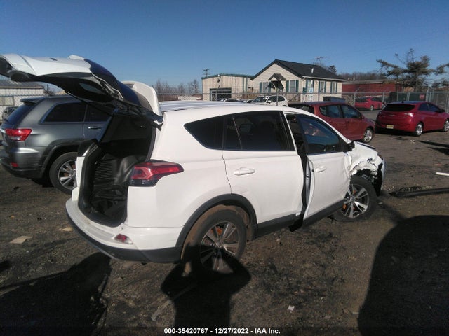 2018 Toyota RAV4, VIN: 2T3WFREV3JW476208