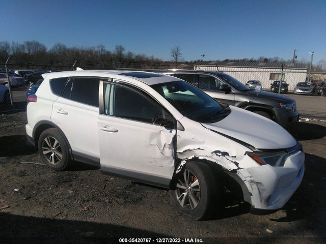 2018 Toyota RAV4, VIN: 2T3WFREV3JW476208