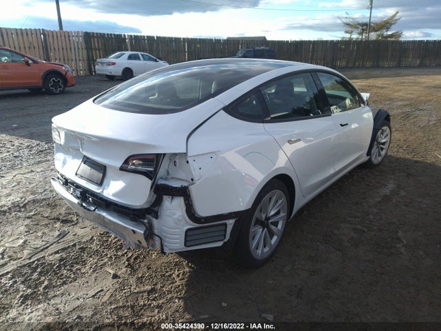 Tesla Model 3 Standard Range Plus 2021 5YJ3E1EAXMF990863 Image 6