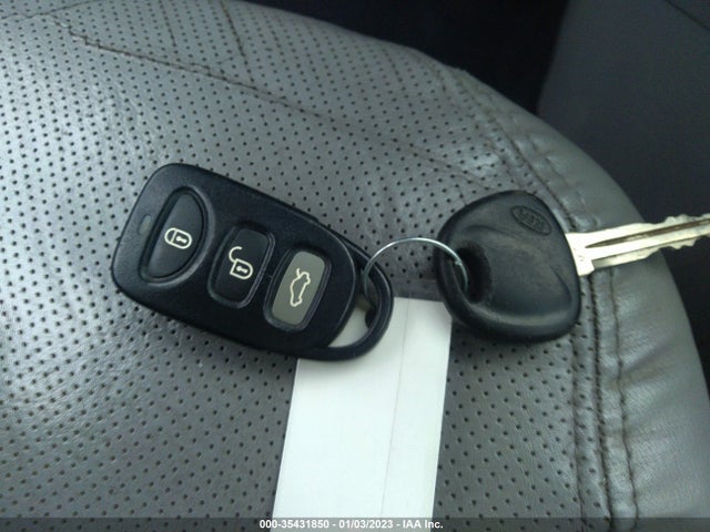 2007 KIA OPTIMA EX VIN: KNAGE124175143507